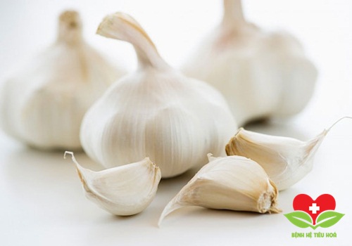 Bài thuốc dân gian chữa hết đau bụng kinh từ tỏi tươi Bài thuốc dân gian chữa hết đau bụng kinh từ tỏi tươi